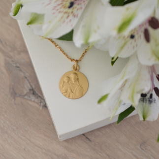 notre dame du scré coeur medaille de bapteme laudate